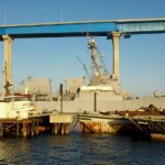 Naval ship below Coronado Bay Bridge